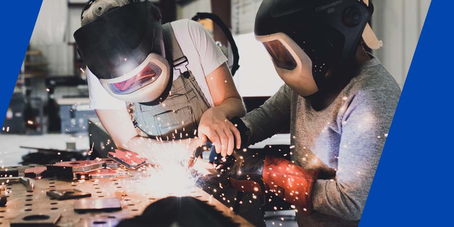 students welding