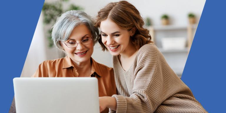 Mother and daughter looking at a website