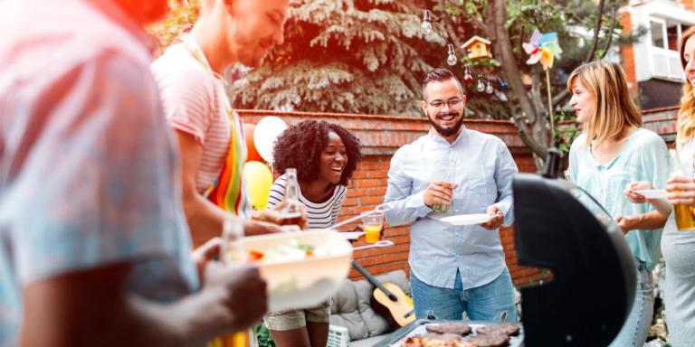 Friends gathering for a BBQ and having a good time.