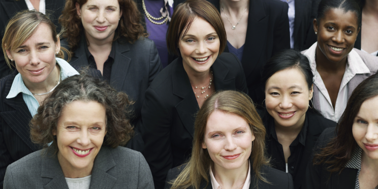 A group of women in business attire