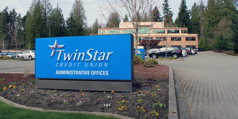 TwinStar Sign in front of corporate building