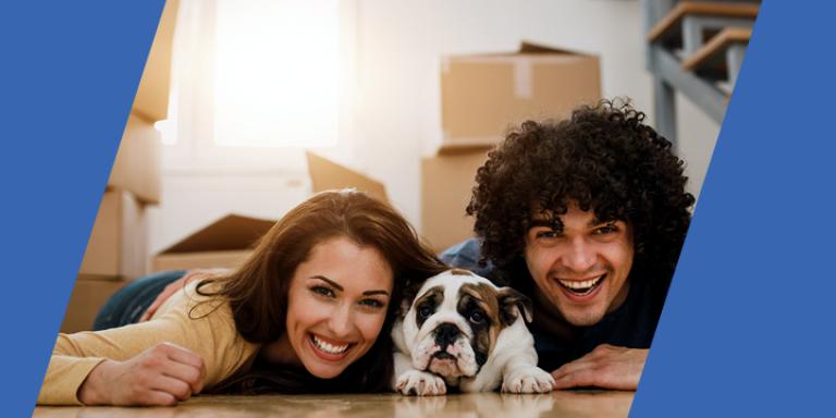 Woman, dog, and man in their new home