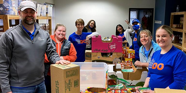 TwinStar Volunteers Packing for All Kids Win