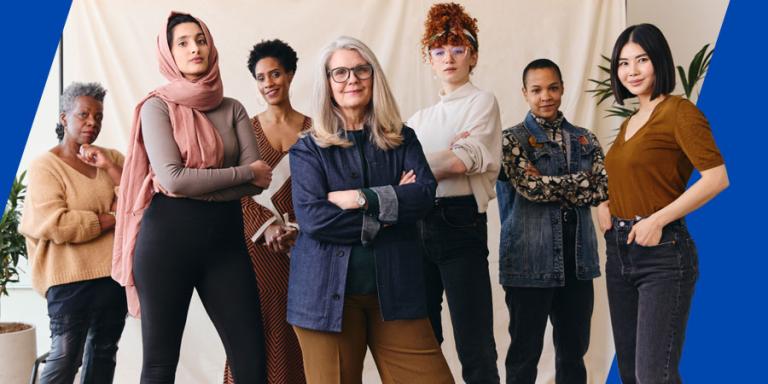 Women's Equality Day portrait of multi ethnic mixed age range women looking confidently towards camera.