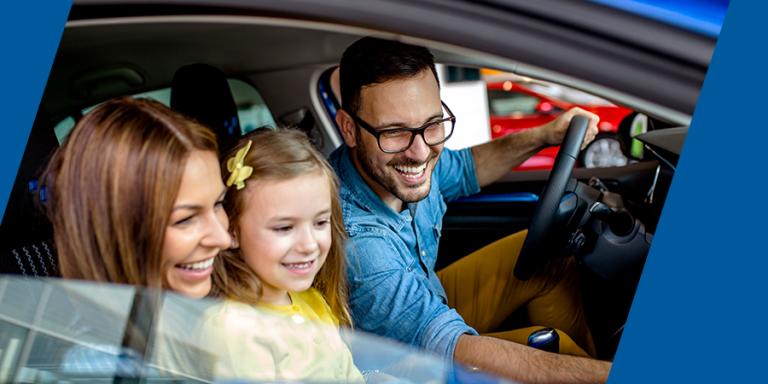 Family in their new car