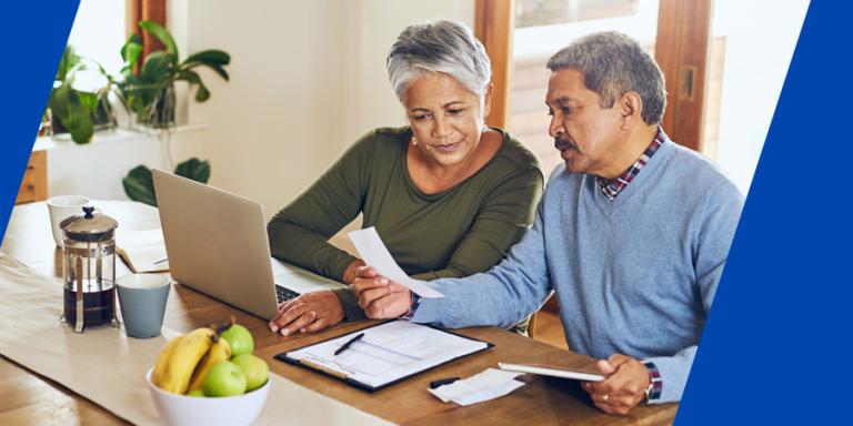 Older couple working on their budgeting plan.