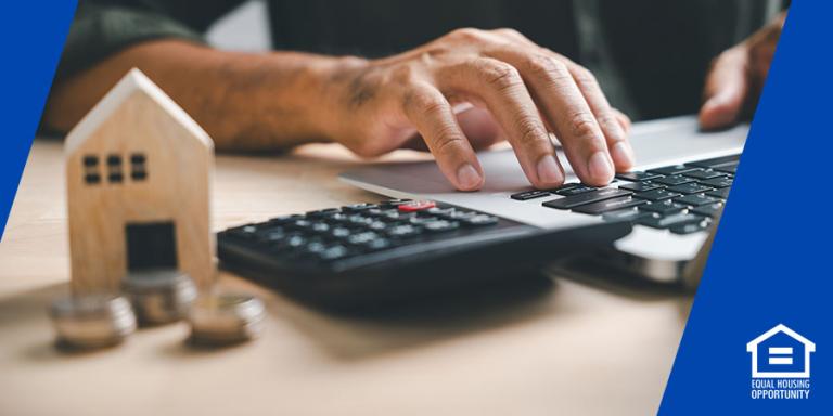 Homeowner paying their monthly mortgage online.