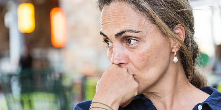 Woman looking nervous and concerned